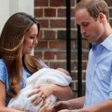 Prince william and princes kate watching their son